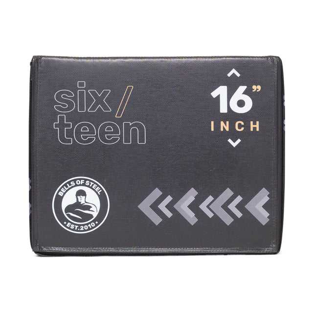 Black rectangular box labeled "six/teen 16 inch" in white and orange, featuring a circular "Bells of Steel - Est. 2010" logo with right-pointing arrows. This home gym tool functions as a 3-in-1 Foam Soft Plyo Box, supporting up to 350lb.