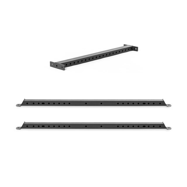 Three views of Bells of Steel Hydra Flat Foot Components—black metal bracket with multiple evenly spaced holes—are shown from angle, front, and top perspectives for enhanced Hydra power rack stability and mounting versatility.