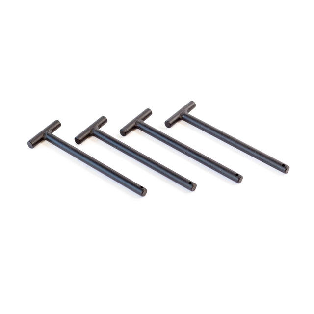 Four Bells of Steel Standard Band Pegs, black T-shaped metal pegs for securing resistance bands on a power rack, are arranged diagonally on a white background, evenly spaced and parallel.