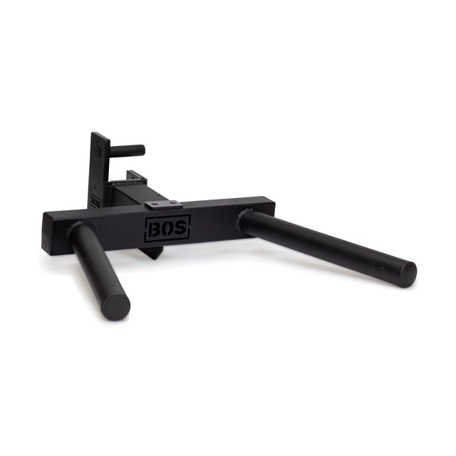 The Bells of Steel Y Dip Bar Rack Attachment is a black, wall-mounted dip bar with BOS branding, featuring two padded handles and robust construction. Ideal for upper body exercises, it includes square brackets and UHMW lining for secure mounting.
