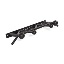 The Bells of Steel Globe Pull Up Bar is a black metal wall-mounted rack with five spherical knobs of varying sizes and angled hooks, arranged along a horizontal bar for strength training enthusiasts.