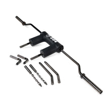 The Bells of Steel Safety Squat Bar – The SS4 is a black bar with padded shoulder rests and multiple interchangeable handles and attachments, ideal for leg day, shown on a white background.