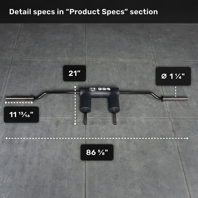 The Bells of Steel Safety Squat Bar - The SS4 sits on a tiled floor, featuring 21" between pads, an 11 13/16" handle height, an 86 5/8" overall length, and a 1 1/4" handle diameter—ready for your next leg day.