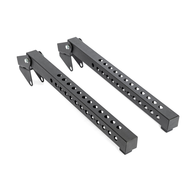 The Bells of Steel Lever Arms Rack Attachment features two black metal arms with multiple evenly spaced holes and hinge mechanisms at one end, designed for mounting or providing support.
