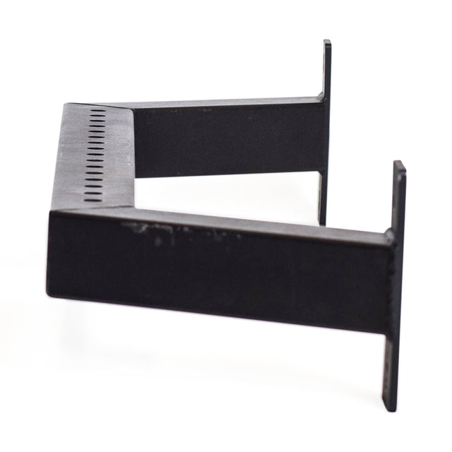 The Bells of Steel Rear Base Stabilizer is a black metal bracket with a rectangular shape, two flared ends, and evenly spaced holes along the top, designed for 3x3 uprights on a power rack. Photographed on a white background.