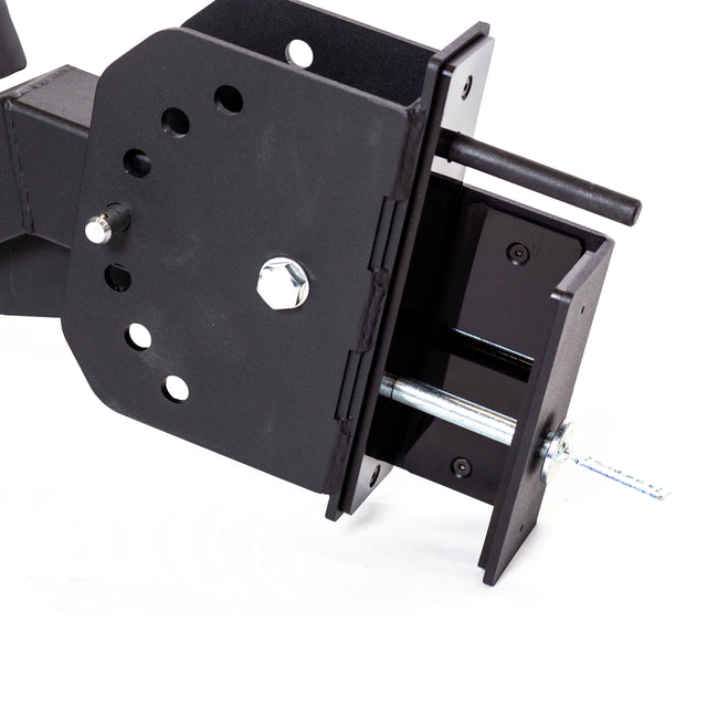 Close-up of the Bells of Steel Seal Row Pad Rack Attachment, a black metal bracket with multiple holes, bolts, and threaded rods designed for chest support on power racks. Mechanical components are shown against a white background.
