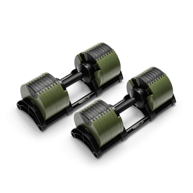The NÜOBELL Adjustable Dumbbells by Nuobell feature machined steel weight plates in green and black on black bases, designed for customizable weight training.
