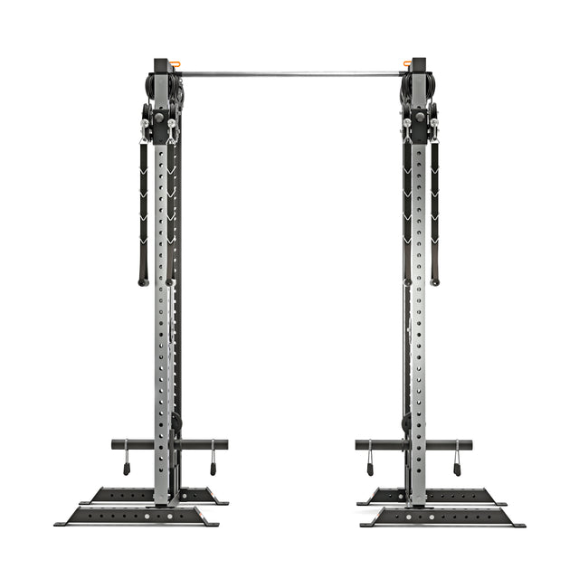 The Bells of Steel Cable Tower Squat Stands is a black and silver gym machine featuring adjustable pulleys, a sturdy metal frame, and an integrated pull-up bar, shown from the front against a white background.