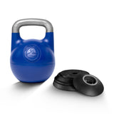 The Bells of Steel Adjustable Competition Kettlebell with a silver handle sits beside four black weight plates on a white background, perfect for kettlebell training.