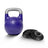 The Bells of Steel Adjustable Competition Kettlebell, featuring a purple body and silver handle, sits beside three black interchangeable weight plates on a white background—ideal for effective kettlebell training.