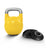 The Bells of Steel Adjustable Competition Kettlebell, featuring a yellow body and silver handle, is displayed next to several black weight plates on a white background.