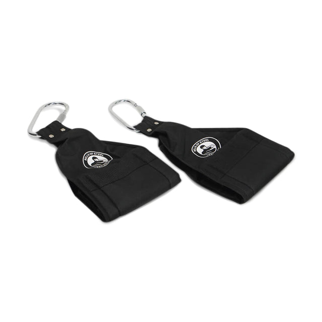 The Bells of Steel Hanging Ab Straps (Pair) are black fabric straps with metal carabiner clips and a white-grey circular logo, shown flat on a white background—ideal for arm support during core workouts.