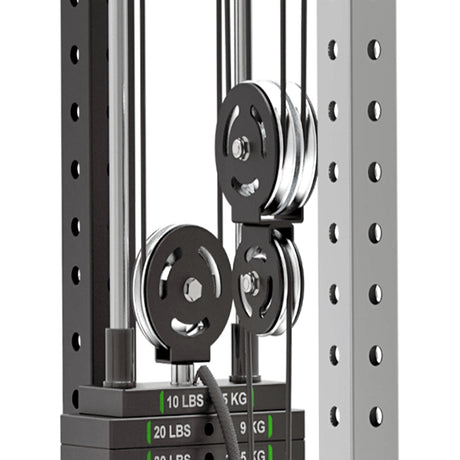Close-up of the Bells of Steel Aluminum Pulley Wheel Upgrade Kit for Plate Loaded Cable Tower, highlighting two aluminum pulleys, cables, a dual-labeled weight stack (lbs/kg), and a metal frame with multiple adjustment holes.