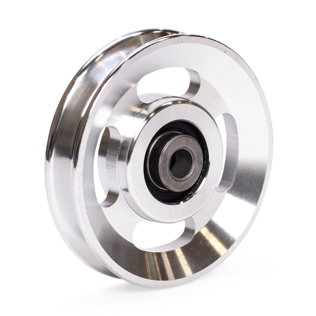 The Bells of Steel Aluminum Pulley Wheels & Upgrade Kits feature a shiny metallic finish, three oval cutouts, and a central bearing—ideal for upgrading your cable machine. Photographed on a clean white background.