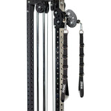 A close-up of Bells of Steel Adjustable Length Aluminum Handles, paired with metal rings on a gym machine. The black frame’s multiple holes allow for handle adjustments, making these handles versatile gym accessories.
