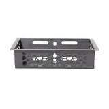The Bells of Steel Rack Attached Storage Basket is a black rectangular metal basket with patterned cut-out sides, two horizontal slots, and a circular hole at the back—perfect for organizing gym or fitness accessories.