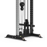 Close-up of the Bells of Steel Cable Tower's lower section, showing metal columns with holes, weight stack, black base supports, pulleys, and cables designed for strength training exercises.