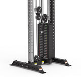 A close-up of the Bells of Steel Cable Tower’s weight stack, featuring labeled plates in pounds and kilograms. The black and silver frame includes adjustable holes and supports Adjustable Handles.