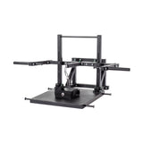 The Bells of Steel Belt Squat Machine is a black metal unit with a flat platform, two horizontal handles, an adjustable frame, and a hanging chain for weights—perfect for home gym lower body workouts, shown on a white background.