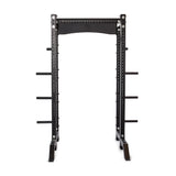 The Bells of Steel Hydra Collegiate Power Rack - Prebuilt (3" x 3", ⅝" Holes) is a black steel rack with multiple weight plate holders on each side, designed for strength training, shown upright against a white background.