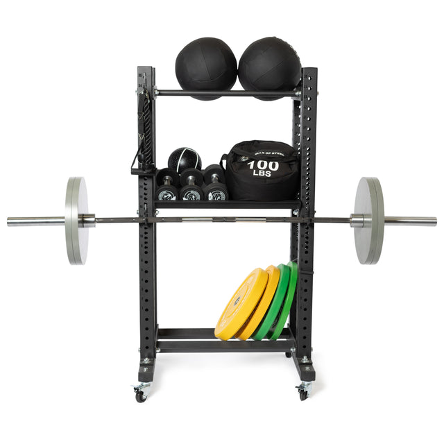 The Bells of Steel Utility Hook is a versatile gym storage solution that neatly organizes kettlebells, medicine balls, sandbags, barbells with weights, and plates—securely stored on a wheeled metal frame.