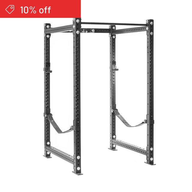 The Bells of Steel Hydra Four Post Power Rack Builder (3" x 3", ⅝" holes) in black metal is shown with adjustable holes and safety straps on a white background. A red "10% off" banner with a price tag icon appears in the top left corner—ideal for home gyms.