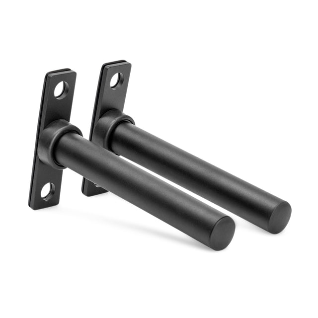 The Bells of Steel Bolt-On Plate Pegs are black metal rods with rectangular mounting plates and screw holes, designed for wall mounting and ideal for storing Olympic weight plates. Shown parallel at an angle on a white background.