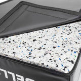 Close-up of Bells of Steel Deadlift Pads (Pair) showing the black vinyl cover partly open to reveal thick white foam padding with blue, black, and gray specks inside.