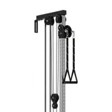 A close-up of the Bells of Steel Cable Tower shows its black pulleys, metal frame, weight stack, adjustable holes, and single handle attachment for gym or fitness use.