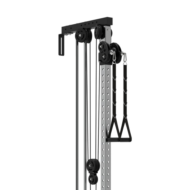 A close-up of the Bells of Steel Cable Tower shows its black pulleys, metal frame, weight stack, adjustable holes, and single handle attachment for gym or fitness use.