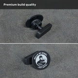 Two views of the Bells of Steel Selfie Sentinel - Magnetic Rack Phone Holder are shown in black metal with a handle, featuring the “Bells of Steel” logo and “EST. 2010” on a gray surface under the heading “Premium build quality.” This accessory effortlessly pairs with any magnetic phone mount, making it an ideal choice for those seeking durability and functionality in their gym setup.