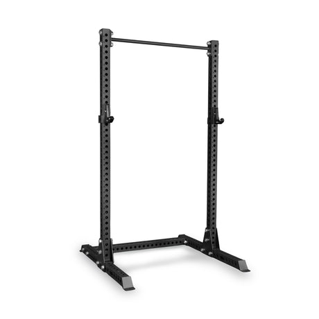 The Bells of Steel Manticore Squat Stand Builder features sturdy 3" x 3" uprights with 1" holes for multiple height settings, adjustable safety hooks, and a pull-up bar, making it an ideal black metal squat rack for weightlifting and strength training in your home gym. Its rectangular base ensures stability during workouts.