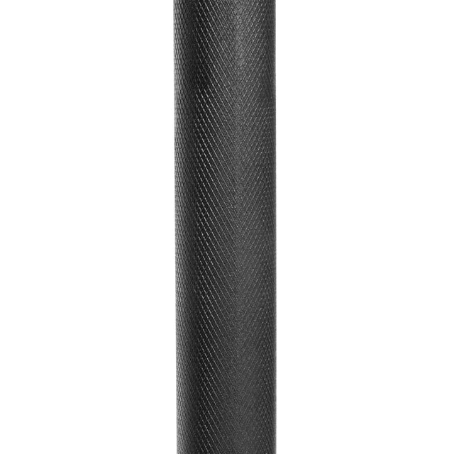 Close-up of a textured black surface resembling an Adjustable Macebell by Bells of Steel. The diamond pattern hints at synthetic material, possibly rubber or plastic, with a matte finish, perfect for boosting core strength and shoulder mobility.