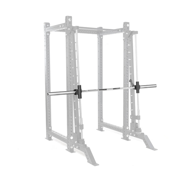 A Bells of Steel Smith Machine Rack Attachment is mounted on a 3x3 rack in faded gray, highlighting the silver barbell with black weight plates. The rack's multiple adjustment holes allow for easy power rack upgrades.