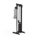 The Bells of Steel Cable Tower is a black and silver strength training machine with adjustable weights, a weight stack, two handles, and a sturdy frame.