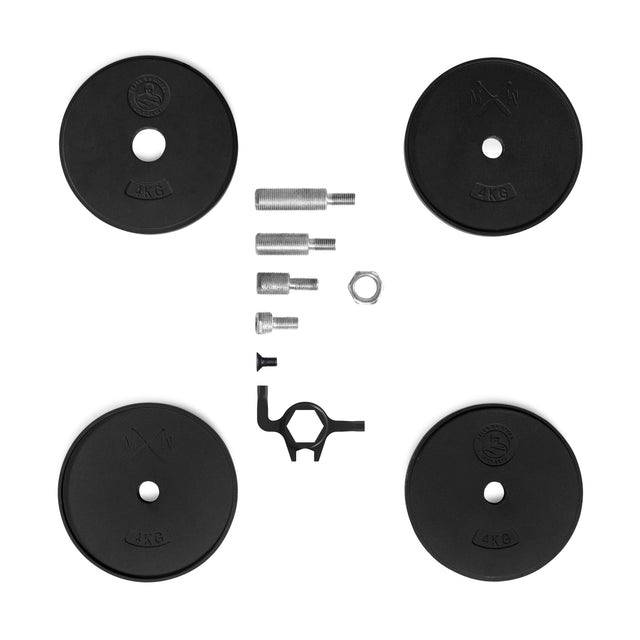 Four black 2 kg weight plates, four metal barbell parts, a nut, and a tool from the Bells of Steel Mark Wildman Adjustable Kettlebell are arranged on a white background, with weights in each corner and hardware centered.