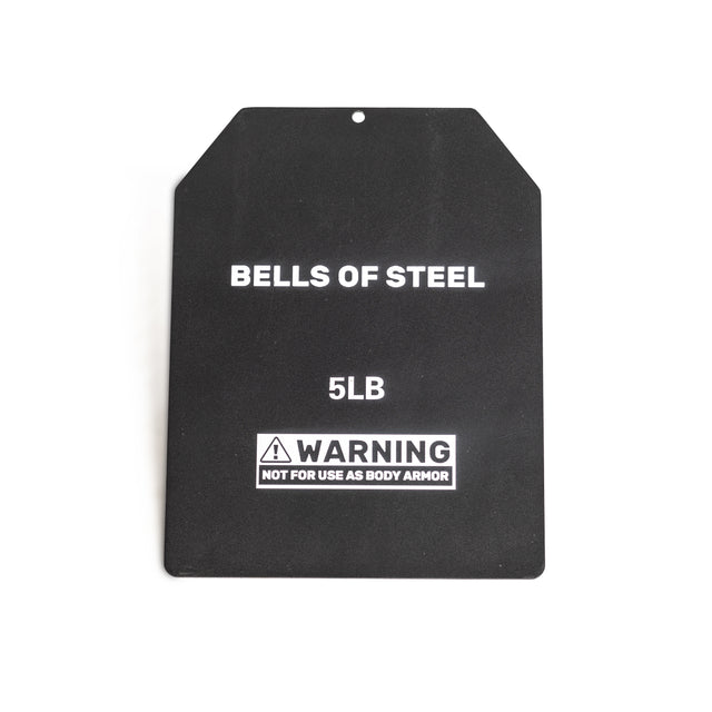 The Bells of Steel Weighted Vest and Plates features a black rectangular plate with angled top corners, labeled "BELLS OF STEEL 5LB" and a front warning, "NOT FOR USE AS BODY ARMOR," making it ideal for workout use.